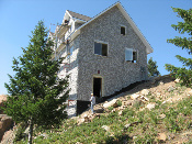 Quad-Lock ICF House Built in Rocks on the side of a hill - Safe and Durable Energy-Efficient Award-Winner CO Image3